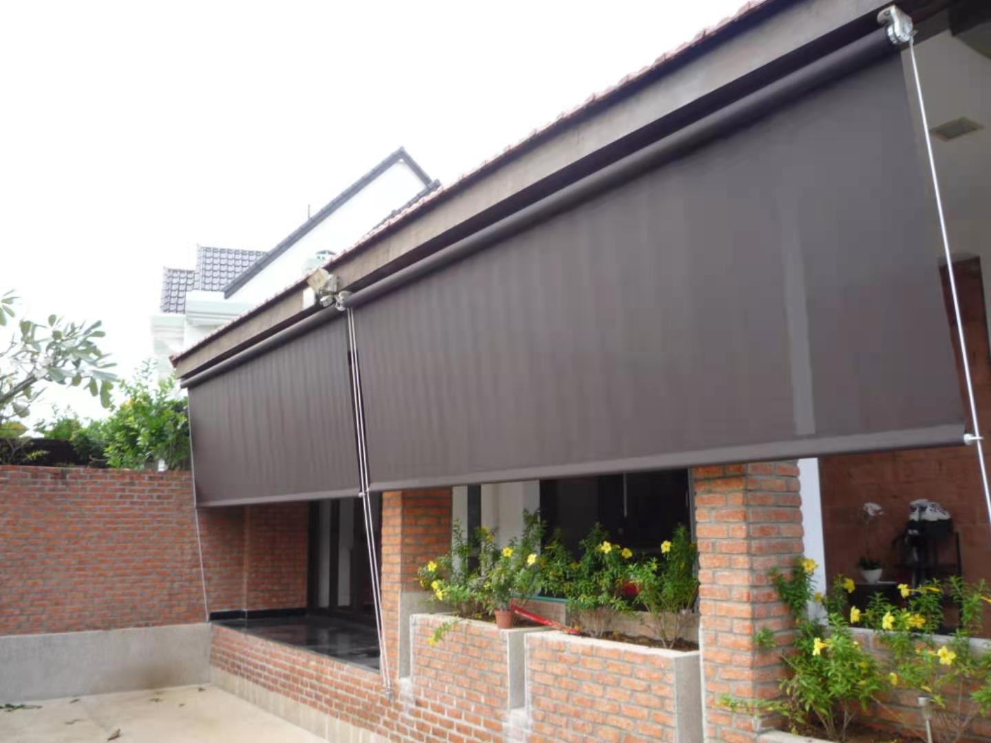 Outdoor blinds installed on a patio in Singapore home
