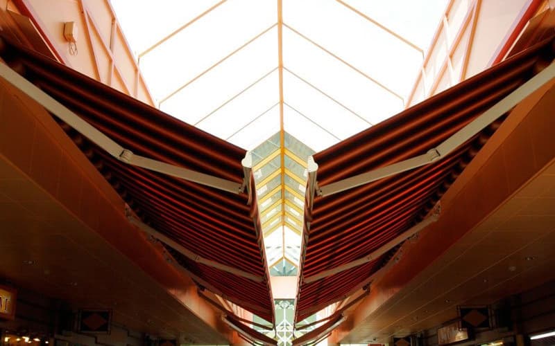 Motorized retractable awning providing sun shade in Singapore